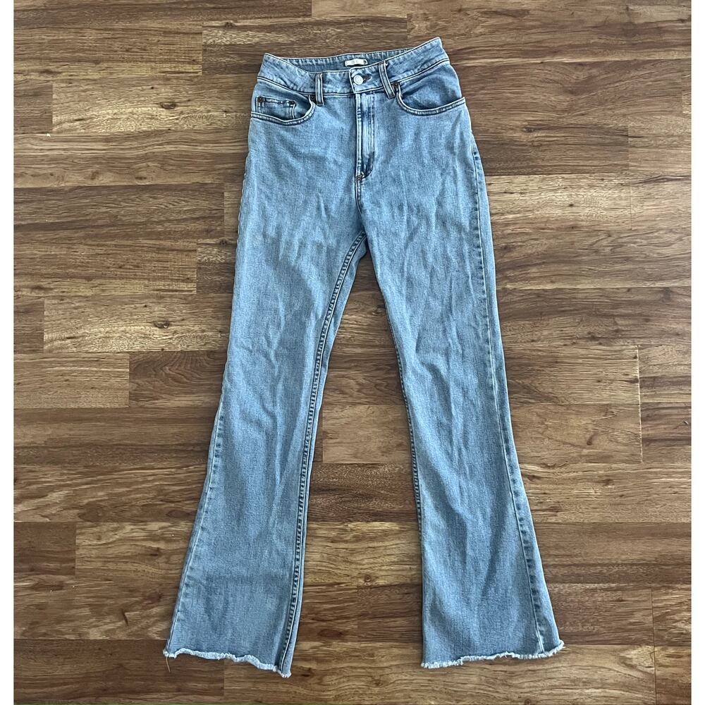 Subdued Light Wash Boot Cut Jeans